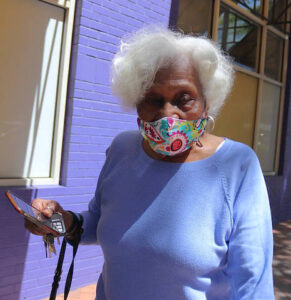 senior wearing a mask