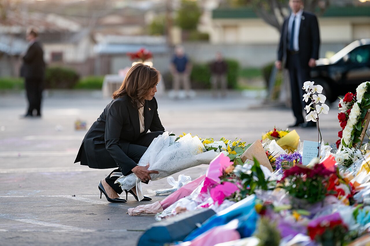 Kamala Harris by mass shooting memorial