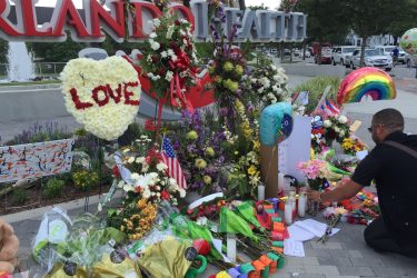 vigil following the Pulse night club shooting in 2016 in Orlando, FL