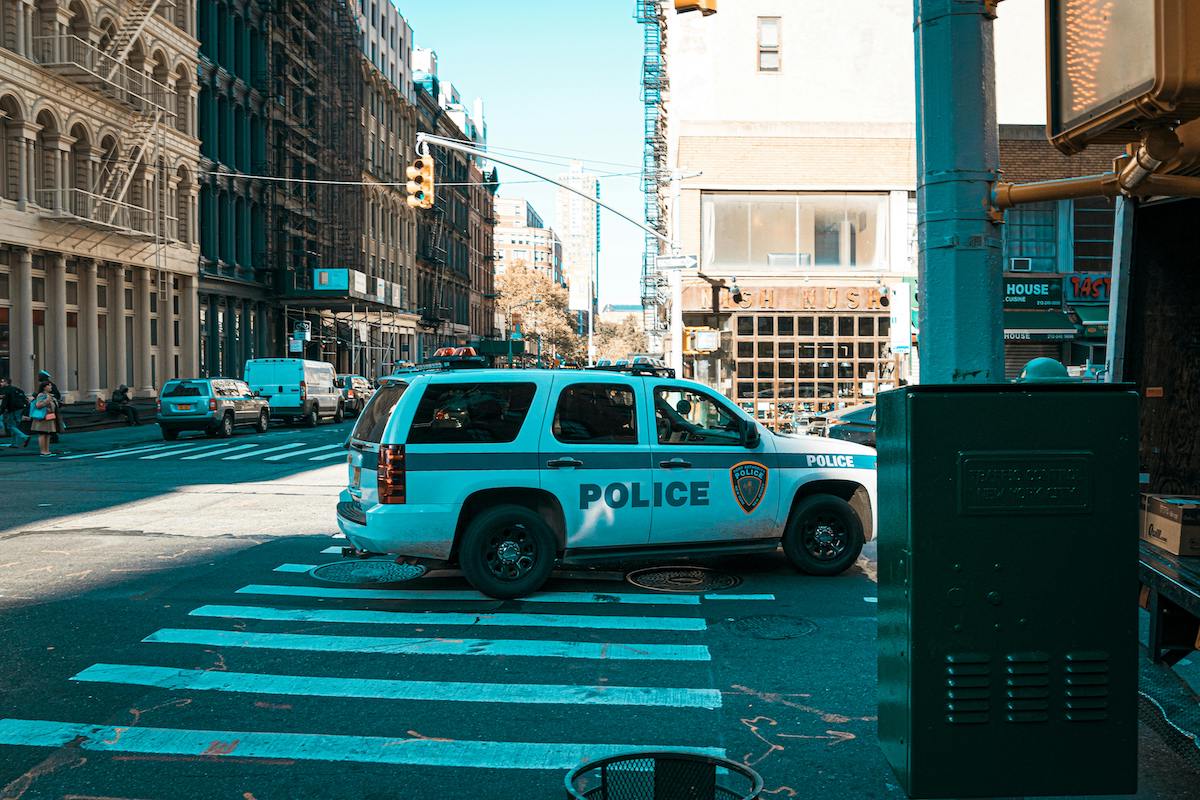a parked police car in the city