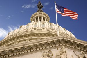 U.S. capitol dome and flag | health insurance featured img