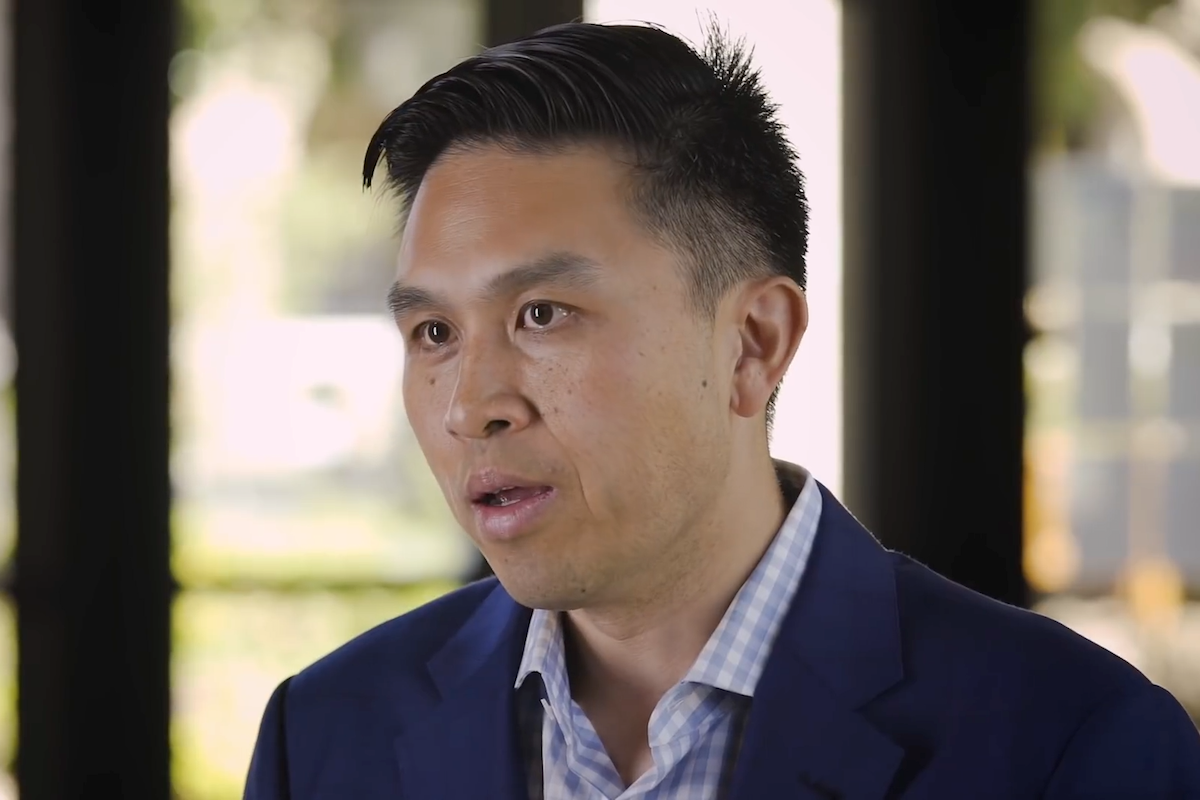 A screenshot from a YouTube video. Stanford University Hoover Institution Fellow Lanhee J. Chen, Ph.D., discusses a public option and the Affordable Care Act.