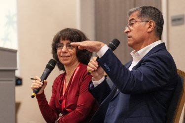 Former HHS Secretary Xavier Becerra speaks to a crowd of journalists at HJ25 in L.A.