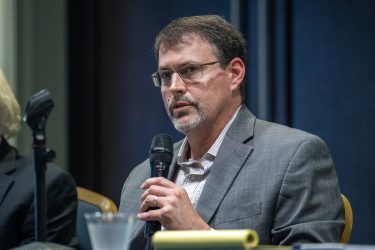 Reuters reporter Chad Terhune speaks at HJ25 about revealing business practices of health insurers