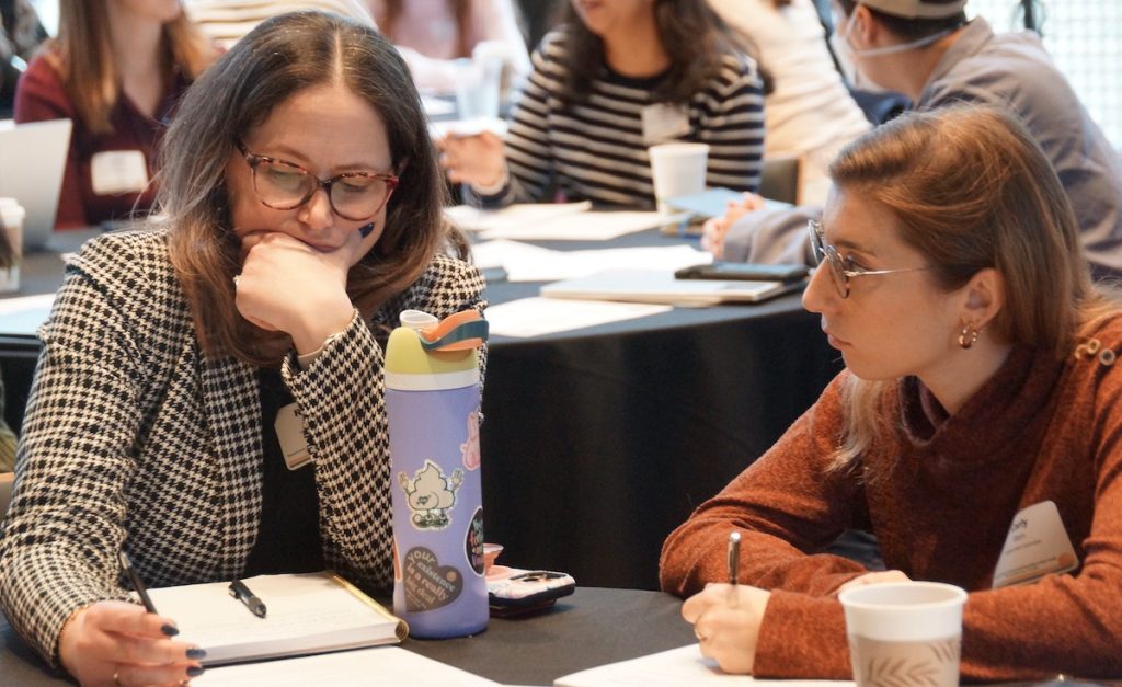 Small groups discuss whether to publish or not publish a story during the ethics session at AHCJ’s Fall Summit. Photo by Erica Tricarico