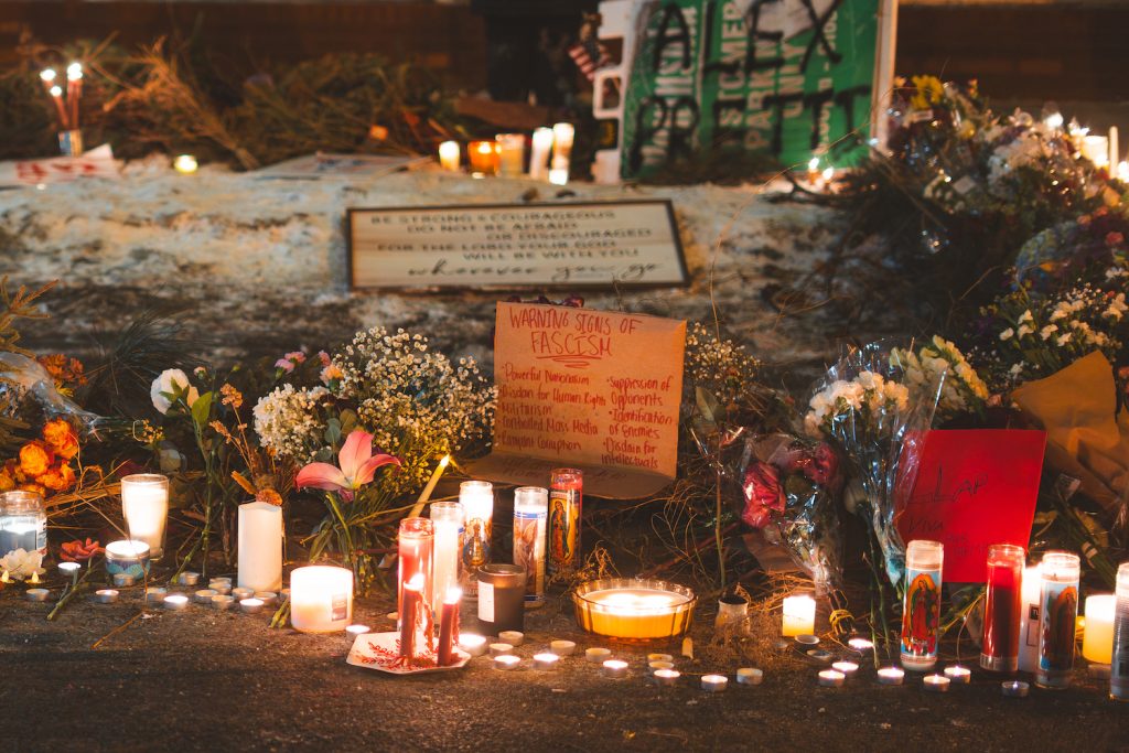 a memorial for Alex Pretti in Minneapolis after he was shot and killed by federal agents