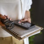 reporter holding a notebook and recording device. pitching featured image