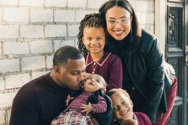 Marcus and Megan Nelson with their children Grace (4 months old), Ella (7 years old), and Francis (5 years old). Photo by Ellie Fuqua/Sun and Sparrow Photography