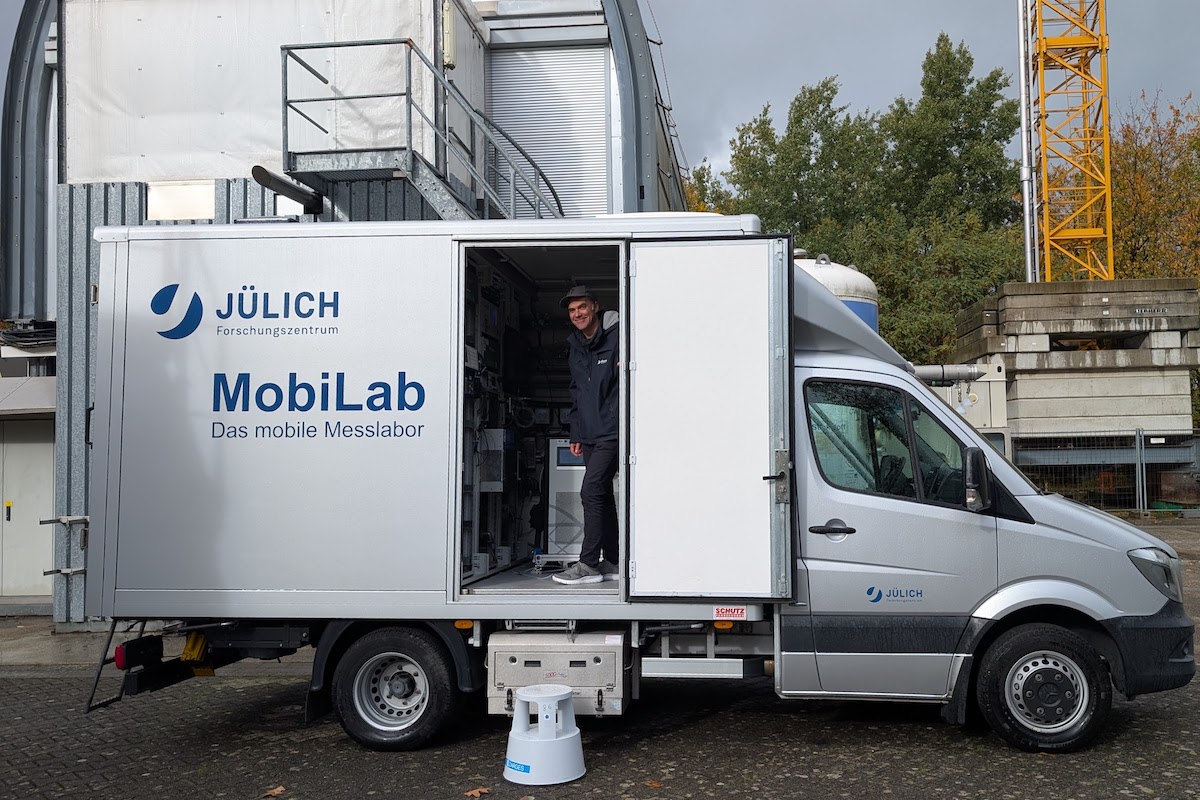 Air pollution chemist Robert Wegener stands in his state-of-the-art mobile air pollution lab, which can measure even the most difficult to detect pollutants such as ultrafine particles at fine scales, even from one street to the next. Wegener’s lab travels all over Germany and Europe to study public health questions about air quality.