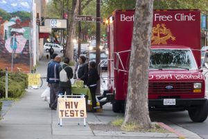 A Berkeley Free Clinic truck offering free HIV tests on a sidewalk in Berkeley, California, at Hearst and San Pablo Ave in 2012. HIV funding cuts could impact services like this.