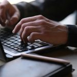 person on computer finding violent crime data