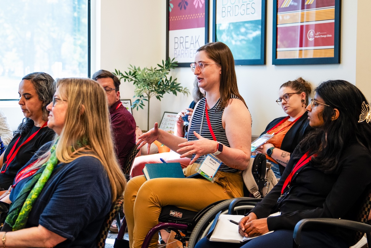 Buffalo Toronto Public Media Disability Reporter Emyle Watkins asks a question at the Inspire Change Clinic during an HJ26 trip to the field. Photo by Zachary Linhares