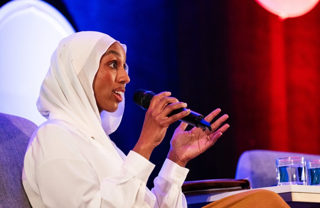 Inspire Change Clinic CEO Munira Maalimisaq speaks during the panel Plenary: The cost of fear: The short- and long-term health consequences of aggressive immigration enforcement 