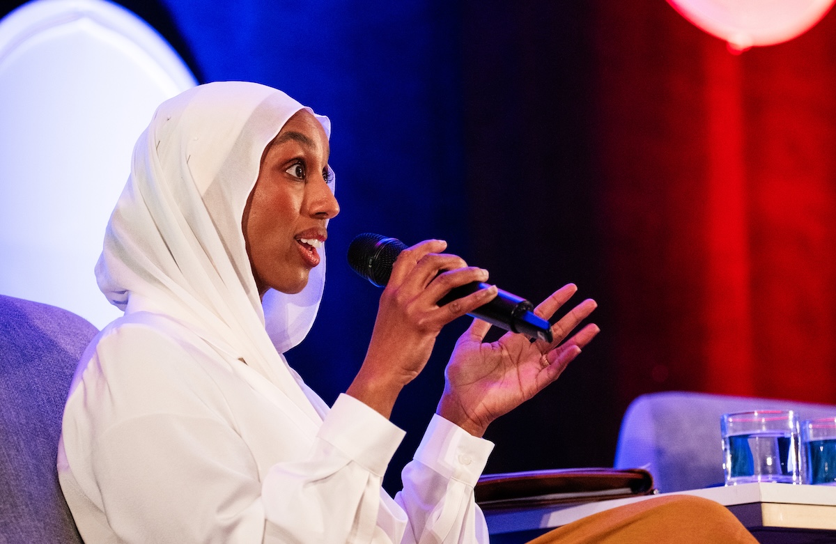 Inspire Change Clinic CEO Munira Maalimisaq speaks during the panel Plenary: The cost of fear: The short- and long-term health consequences of aggressive immigration enforcement