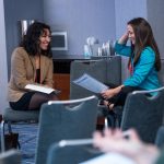 KFF Health News Regional Editor Hayat Norimine, left, talks with AHCJ Board Vice President Christine Herman during the HJ26 session "Better ethical decision-making." Photo by Zachary Linhares