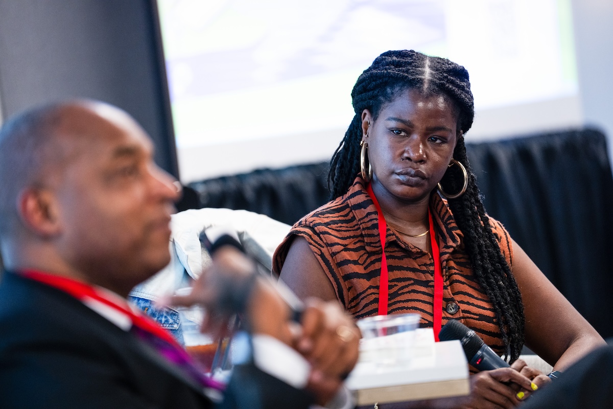 Moderator Abené Clayton listens to Dr. Selwyn O. Rogers, Jr., speak at HJ26. Photo by Zachary Linhares