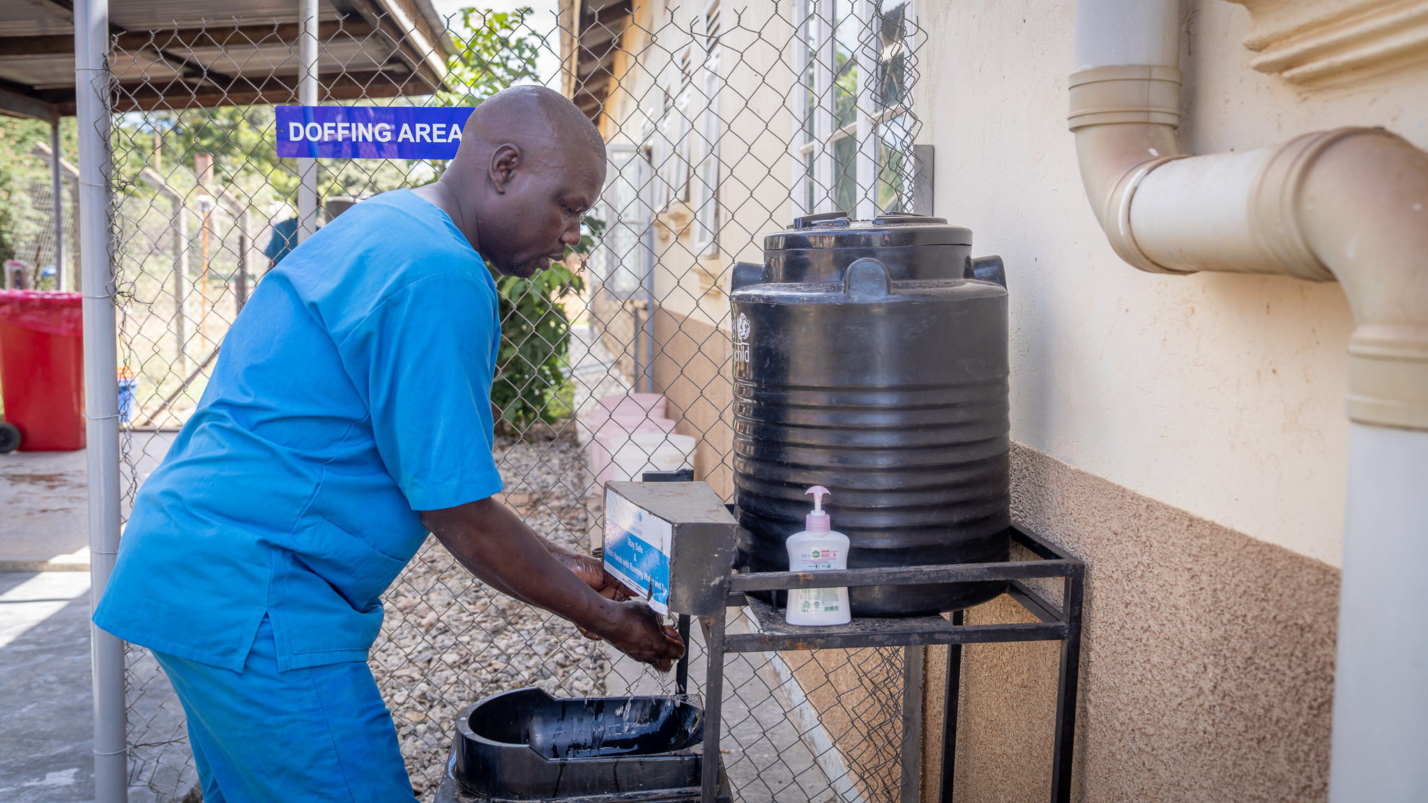 Members of Uganda's Emergency Medical Team attend to contacts of Ebola cases at Oil Health Centre 4's 12-bed isolation unit in Arua, northern Uganda, 25 June 2026.