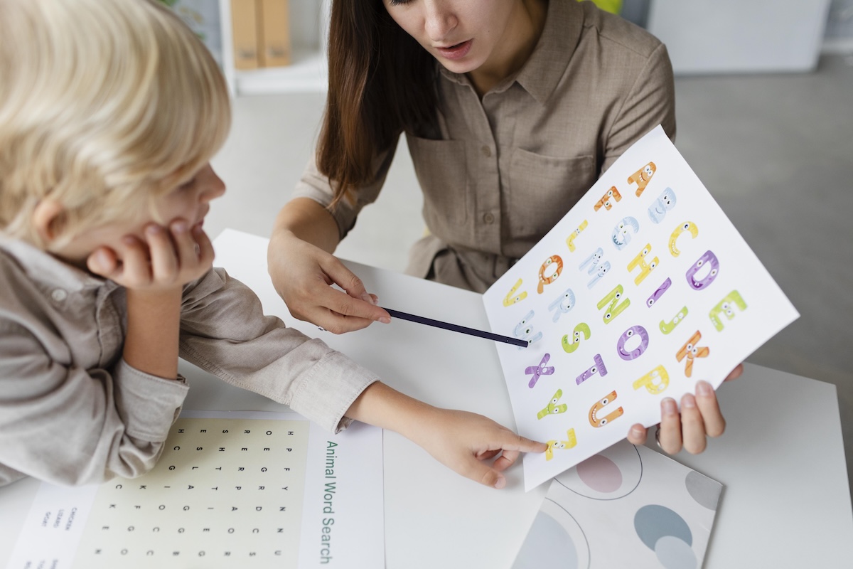 a woman communicating with a nonverbal child