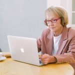 An older adult using a computer. MyChart featured image