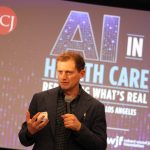 MDCalc co-founder and emergency physician Graham Walker, M.D., speaks at AHCJ's fall summit, AI in Health Care: Reporting What's Real. Photo by Kevin Ridder